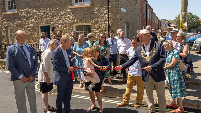 Resident Mandy Knott And Grand Daughter Cutting The Ribbon, The Old Coal Yard, Bridport