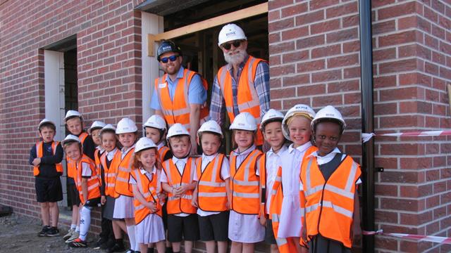 Jonathon Crouch (Left) And Alan Bridgman (Right) With Pupils