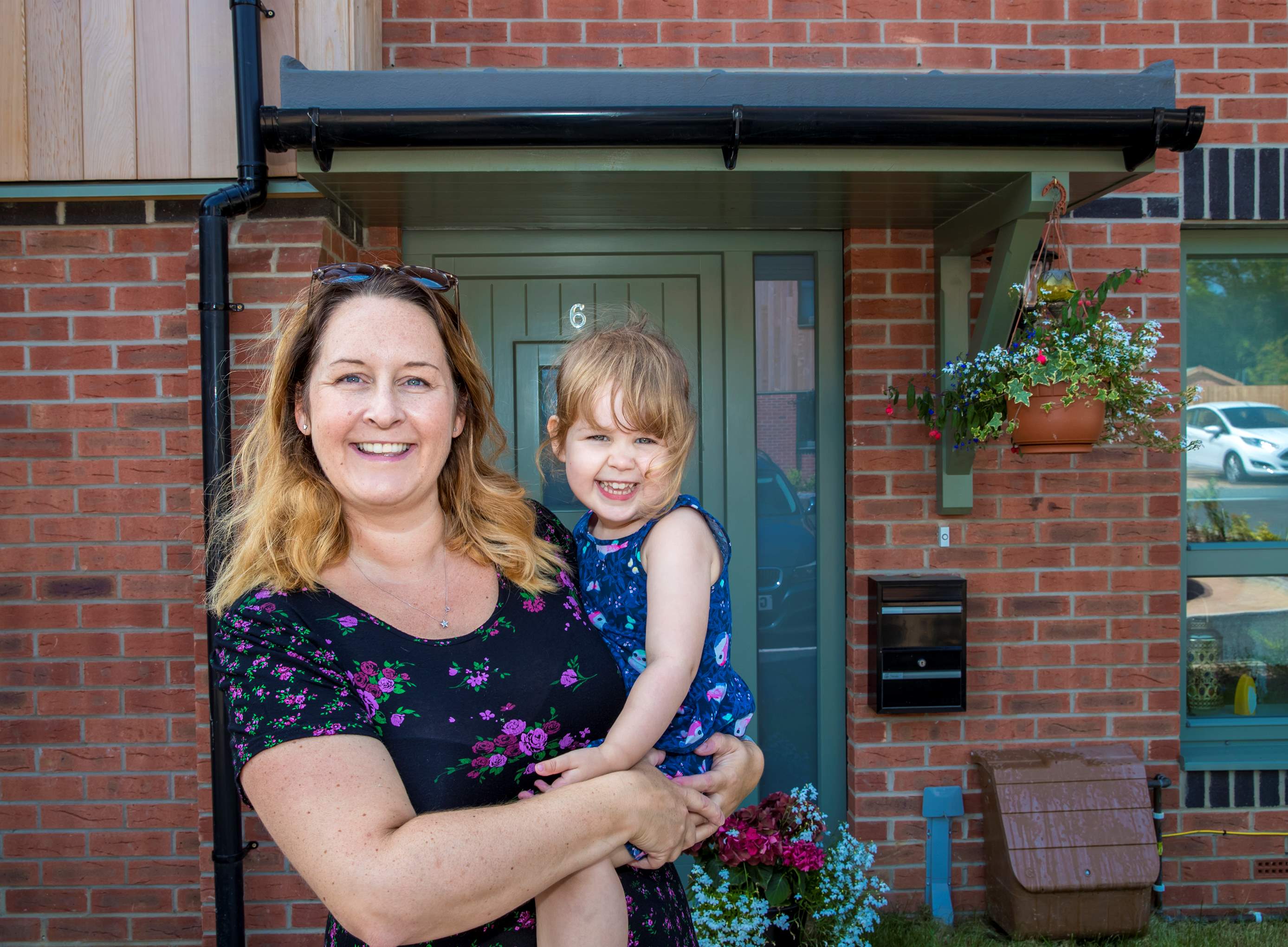 Resident and child outside home 2