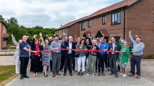 1. District Cllr Mark Packard And Parish Cllr Jane Hall (Centre, Holding Scissors) Cut The Official Ribbon V2