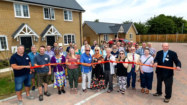 Residents Patrick And Amanda Fox, Centre, Cut The Ribbon